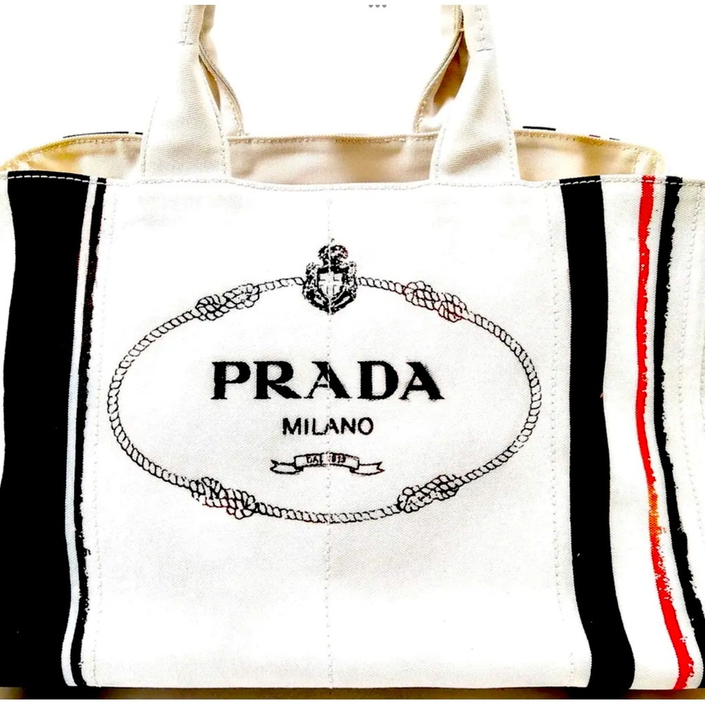 SOLD!!!!!!!!!!😃Prada Hand Bag Canapa White . Prada Logo